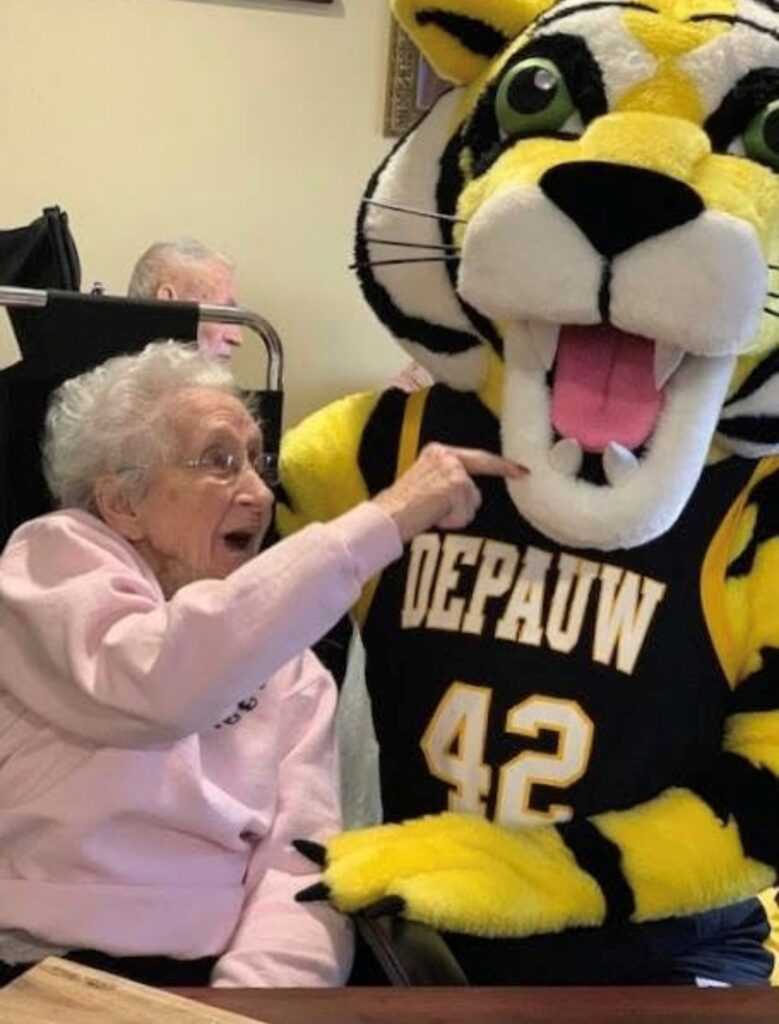 resident with mascot